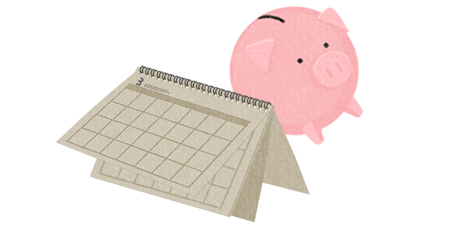 カレンダーと豚の貯金箱
