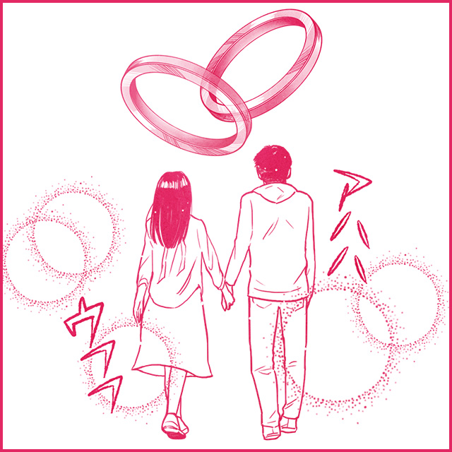 結婚指輪とカップルの後ろ姿