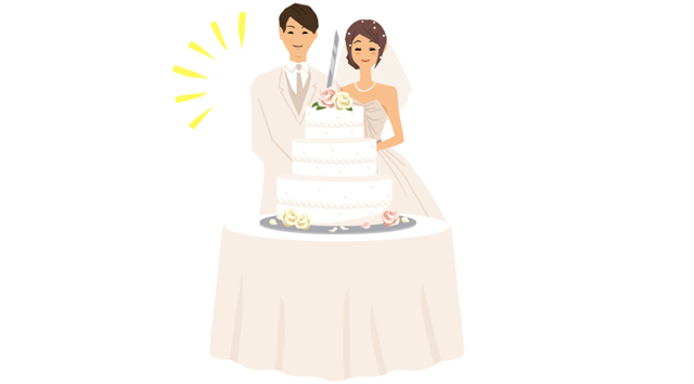 ケーキ入刀をする新郎新婦