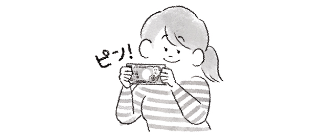 お札を持つ女性