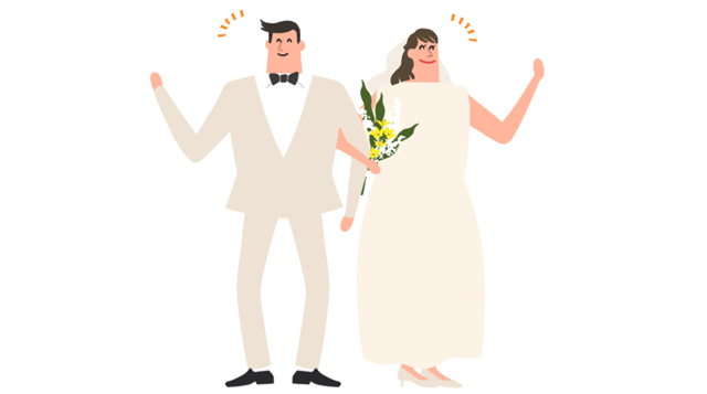 結婚式を挙げるカップル