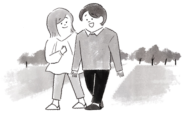 道を歩くカップル