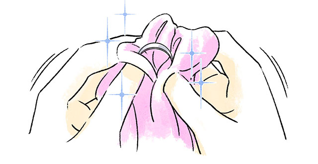 指輪を手入れしているイラスト