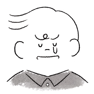 涙をこぼす男性