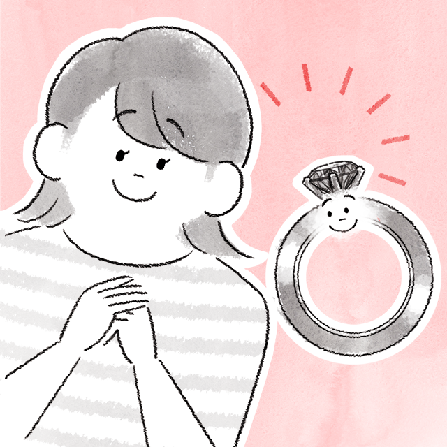 婚約指輪と微笑む女性の様子