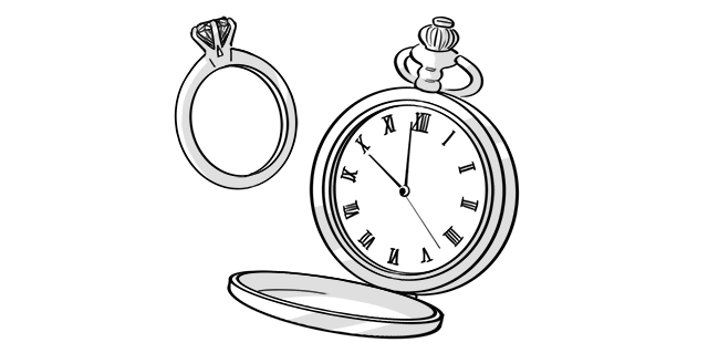 大きなダイヤモンドの婚約指輪と時計