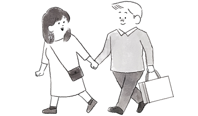 一緒に買い物をするカップル