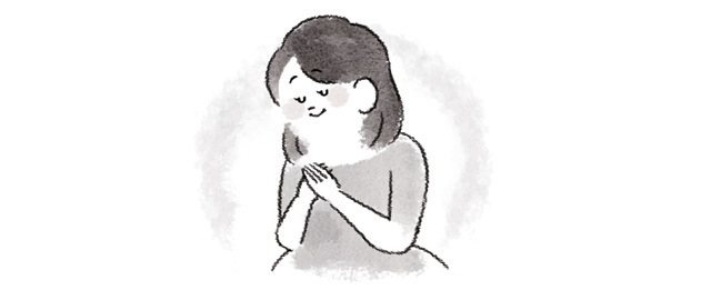 想いを込める女性