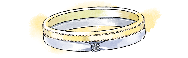 プラチナの結婚指輪とイエローゴールドのファッションリングの重ねづけ