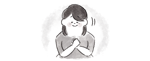 頷く女性