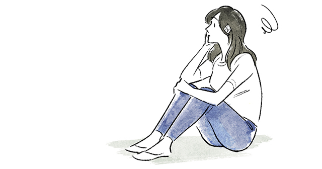不安を感じて落ち込む女性