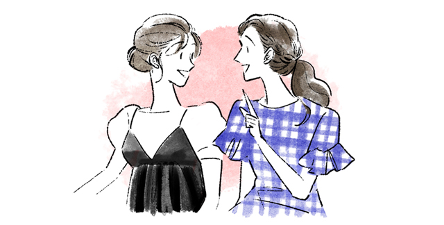 友人と話す女性