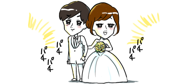 腕を組んで退場する新郎新婦