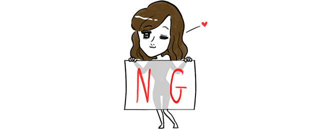 NGの札を掲げる女性