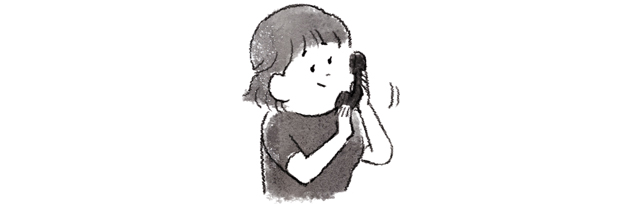 電話をかける女性