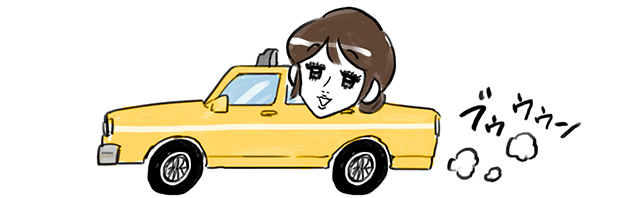 タクシーに乗っている女性