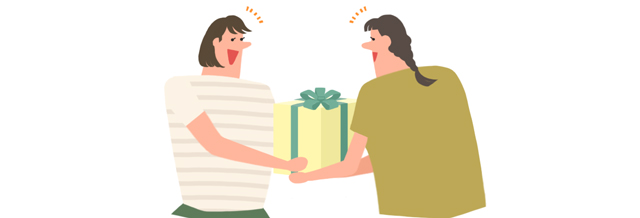 友人にプレゼントを渡す女性