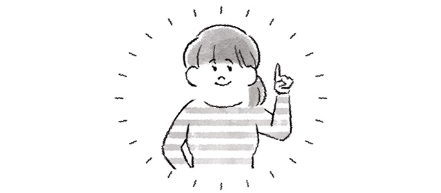 人差し指を立てる女性