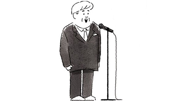 背筋を伸ばしてスピーチする男性