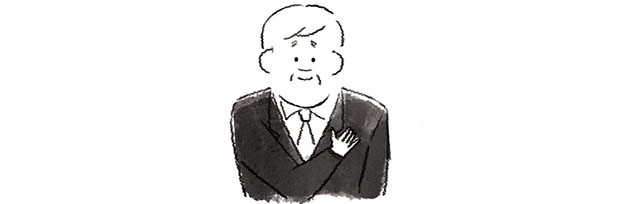 胸に手を当てる男性