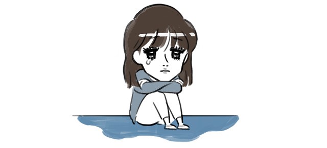 落ち込む女性