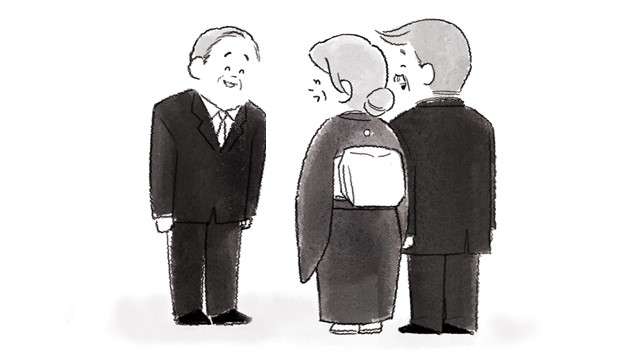 挨拶回りをする新郎新婦の親