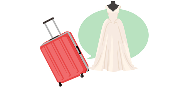 スーツケースとウェディングドレス