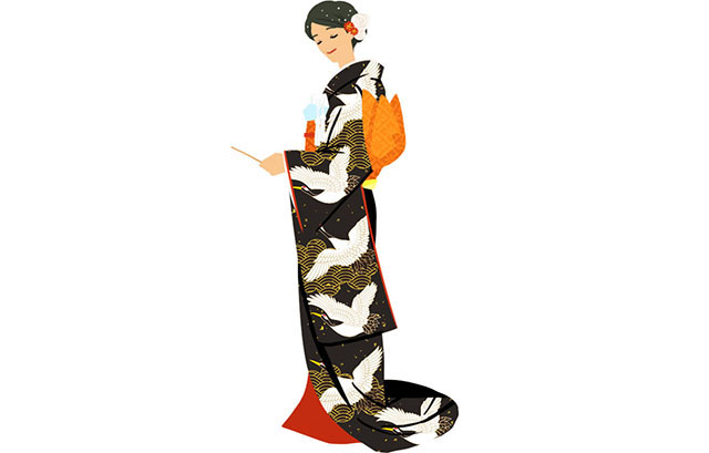 鶴の紋様が入った黒引き振袖を着た女性