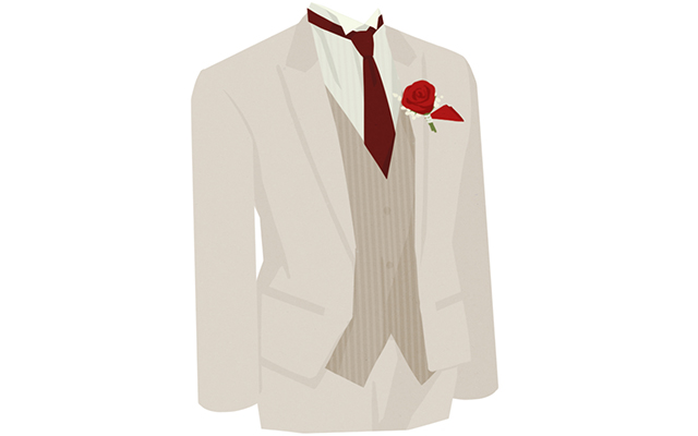 赤いネクタイとポケットチーフをつけたタキシードの着用例