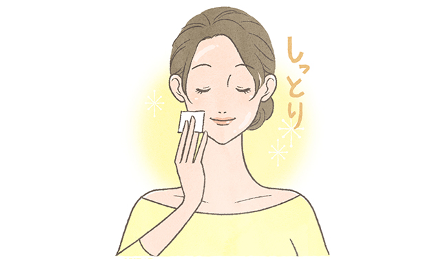 顔の保湿をする女性