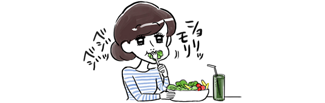 たくさんの野菜を食べる女性