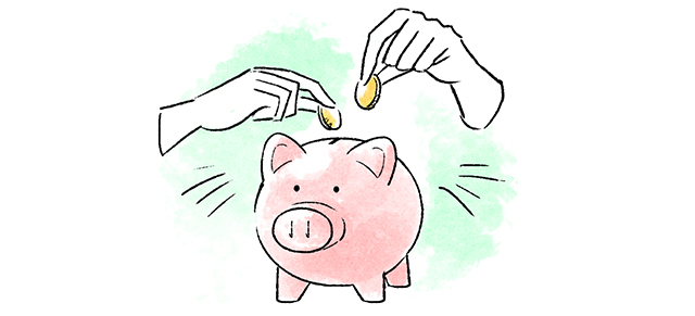 豚の貯金箱に貯金をするカップル